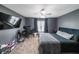Bedroom featuring gray walls, a mounted TV, and neutral carpet at 4118 Kentmere Main Nw, Kennesaw, GA 30144