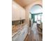 Butler's Pantry features granite countertop and ample storage at 4118 Kentmere Main Nw, Kennesaw, GA 30144