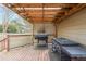 Outdoor deck features a built-in grill and cooking area perfect for entertaining at 4118 Kentmere Main Nw, Kennesaw, GA 30144