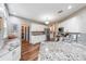 Bright kitchen showcasing granite counters, stainless steel appliances, and ample cabinet space at 4118 Kentmere Main Nw, Kennesaw, GA 30144