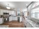 Open concept kitchen featuring granite counters, stainless appliances, and hardwood floors at 4118 Kentmere Main Nw, Kennesaw, GA 30144