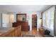 Comfortable bedroom featuring wooden bed frame and dresser with access to a walk-in closet at 47 Monet Nw Ct, Atlanta, GA 30327
