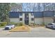 Well-maintained apartment with neutral exterior, parking and landscaping at 47 Monet Nw Ct, Atlanta, GA 30327