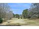 Expansive view of the well-manicured golf course at 47 Monet Nw Ct, Atlanta, GA 30327