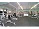 Bright gym with floor-to-ceiling mirrors, weight machines, free weights, and an amazing view at 47 Monet Nw Ct, Atlanta, GA 30327