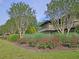 Beautiful landscaping surrounds the building in this serene setting at 47 Monet Nw Ct, Atlanta, GA 30327