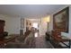 A glimpse of the living area from another room, showcases the decor, furnishings, and spaciousness at 47 Monet Nw Ct, Atlanta, GA 30327