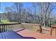 Deck overlooking lawn and treeline providing an outdoor extension of the home at 1450 Pinyon Pl, Lawrenceville, GA 30043