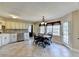 The breakfast area is open to the kitchen and has tile floors, lots of windows, and a door to the back deck at 1450 Pinyon Pl, Lawrenceville, GA 30043