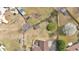 An aerial view shows the property's generous lot size featuring a shed, trees, and landscaping at 251 Bent Creek Dr, Dallas, GA 30157