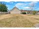 Large backyard with a wooden fence, ideal for pets and privacy, offering ample space for various outdoor uses at 251 Bent Creek Dr, Dallas, GA 30157