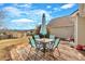 Backyard with patio and seating area ideal for entertaining or enjoying the outdoor scenery at 251 Bent Creek Dr, Dallas, GA 30157