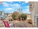 Backyard patio with lush landscaping and peaceful seating area, perfect for outdoor relaxation at 251 Bent Creek Dr, Dallas, GA 30157