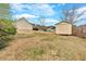Expansive backyard featuring a storage shed on a well-sized lot, providing practical outdoor storage and utility at 251 Bent Creek Dr, Dallas, GA 30157