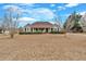 Charming single-story home featuring a cozy front porch and well-maintained landscaping at 251 Bent Creek Dr, Dallas, GA 30157