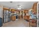 Bright kitchen with a stainless steel fridge, oak cabinets, and a convenient layout at 251 Bent Creek Dr, Dallas, GA 30157