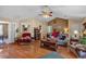 Inviting living room with a vaulted ceiling, hardwood floors, and cozy furniture at 251 Bent Creek Dr, Dallas, GA 30157