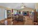 Cozy living room with hardwood floors, large windows, and an open entryway at 251 Bent Creek Dr, Dallas, GA 30157