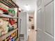 Spacious pantry with shelving and full sized refrigerator offering ample storage at 251 Bent Creek Dr, Dallas, GA 30157