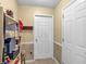 Functional pantry with shelving, a storage cabinet and two doors offering extra space at 251 Bent Creek Dr, Dallas, GA 30157