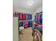 Spacious walk-in closet with extensive hanging space and shelving for optimal organization at 251 Bent Creek Dr, Dallas, GA 30157