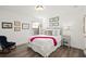 Cozy bedroom with wood floors, chair, bed and modern accents at 2855 Mcmurtry St, Cumming, GA 30041