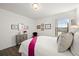 Bright bedroom with hardwood floors and bed at 2855 Mcmurtry St, Cumming, GA 30041