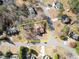 Aerial view of home in a neighborhood with approximate property lines at 6920 Greenfield Ln, Cumming, GA 30028