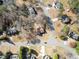 Aerial view of home in a neighborhood at 6920 Greenfield Ln, Cumming, GA 30028