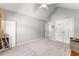 Large bedroom provides vaulted ceiling and access to multiple closets for optimal storage at 6920 Greenfield Ln, Cumming, GA 30028