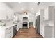 Spacious kitchen boasts stainless steel appliances, granite countertops, and plenty of room to cook and entertain at 6920 Greenfield Ln, Cumming, GA 30028