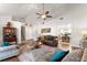 Open-concept living room with vaulted ceilings and comfortable seating at 6920 Greenfield Ln, Cumming, GA 30028