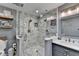 Elegant bathroom featuring a glass enclosed shower with dual showerheads and stylish fixtures at 311 Maranatha Trl, Lawrenceville, GA 30045