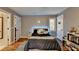 Charming bedroom with modern decor, wood floors, and a cozy atmosphere at 311 Maranatha Trl, Lawrenceville, GA 30045
