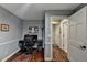 Functional home office with hardwood floors and ample workspace at 311 Maranatha Trl, Lawrenceville, GA 30045
