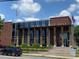 Exterior shot of Chamblee City Hall building with American and Georgia State flags displayed at 5300 Peachtree Rd # 2309, Chamblee, GA 30341