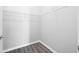 Walk-in closet featuring wire shelves and hardwood floors at 5300 Peachtree Rd # 2309, Chamblee, GA 30341