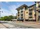 Exterior view of modern apartment buildings with a well-maintained street and sidewalks at 5300 Peachtree Rd # 2309, Chamblee, GA 30341