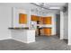 Stylish kitchen boasts wood cabinets, granite countertops, and stainless steel appliances at 5300 Peachtree Rd # 2309, Chamblee, GA 30341