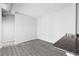 Open-concept living area featuring granite countertops and wood-look floors at 5300 Peachtree Rd # 2309, Chamblee, GA 30341