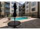 Apartment community pool area with lounge seating and sunbathing space at 5300 Peachtree Rd # 2309, Chamblee, GA 30341