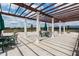 Rooftop patio offers pergola, seating, and views of community at 5300 Peachtree Rd # 2309, Chamblee, GA 30341