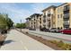 Street view of modern apartment buildings with sidewalks and street parking available at 5300 Peachtree Rd # 2309, Chamblee, GA 30341