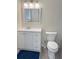 Bathroom with bright vanity, modern fixtures, and toilet at 72 Belmonte Sw Cir, Atlanta, GA 30311