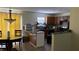 Eat-in kitchen with granite countertops, dark cabinets, and stainless steel appliances at 72 Belmonte Sw Cir, Atlanta, GA 30311