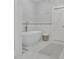 Serene bathroom with a standalone tub, decorative tile accents, and modern fixtures at 91 Webb St, Roswell, GA 30075