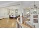 Open kitchen with white cabinets, stainless steel appliances, and a large island with seating at 91 Webb St, Roswell, GA 30075