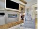 Living room featuring a fireplace, tv, and desk area at 91 Webb St, Roswell, GA 30075