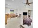 Expansive main bedroom featuring a seating area, TV, and soft carpet underfoot at 91 Webb St, Roswell, GA 30075