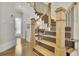 Beautiful staircase with wood and iron railings, leading to the upper level at 91 Webb St, Roswell, GA 30075